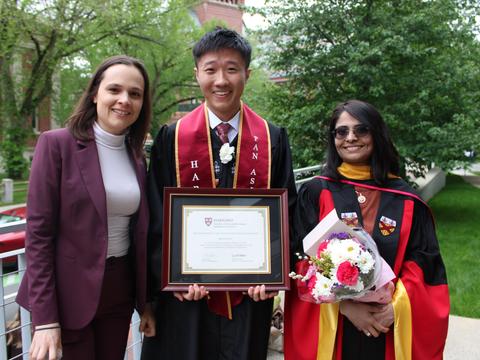 Kenneth Gu posing with Concentrator Award outside of Science Center with Professors Pragya Sur and Morgane Austern